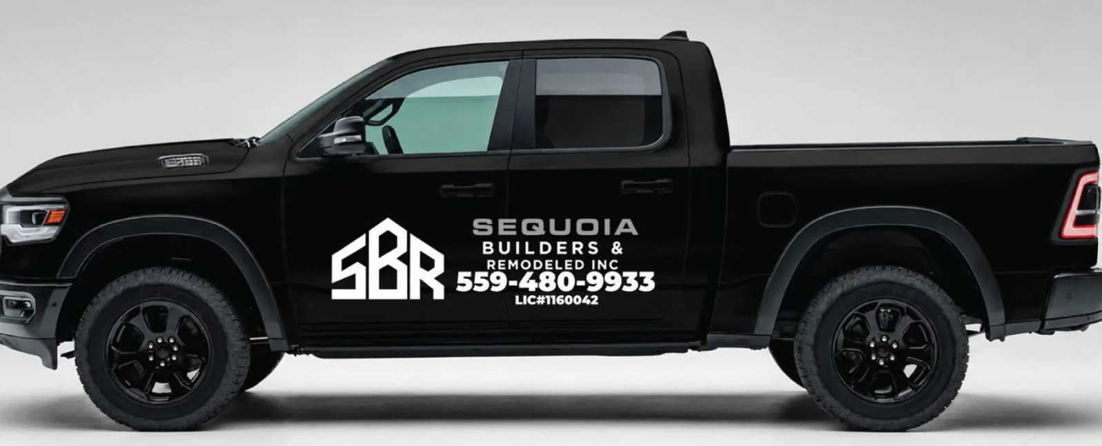 The black Sequoia Builders & Remodel work truck, lettered with the white SBR house-outline mark, the (559) 480-9933 phone number and CSLB license number 1160042.